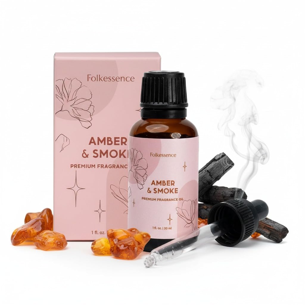 Folkulture Amber & Smoke bottle releasing a warm amber aroma for intimate moments.