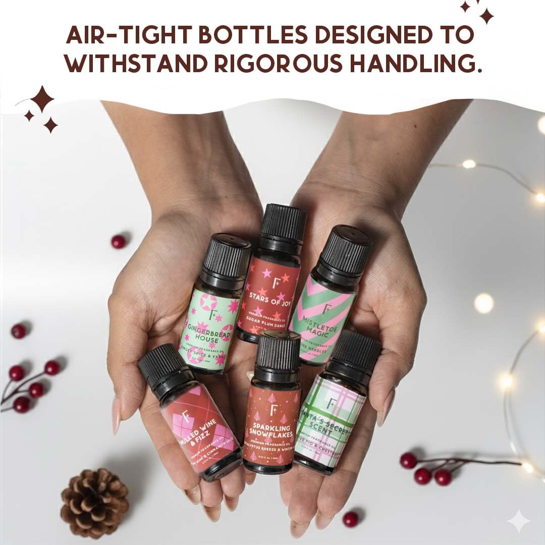 Folkulture diffuser with oils on a cozy holiday table.