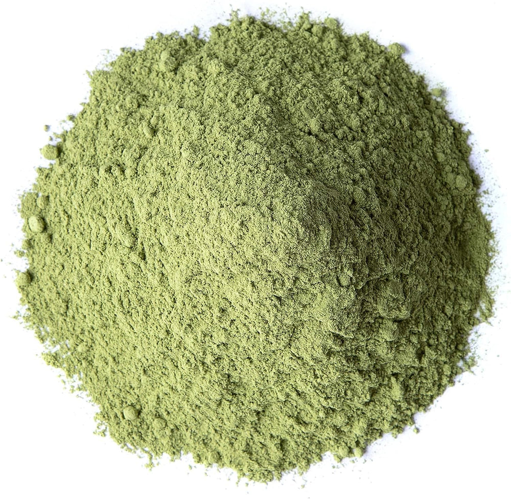 Food to Live alfalfa powder dissolving in water for a greens boost