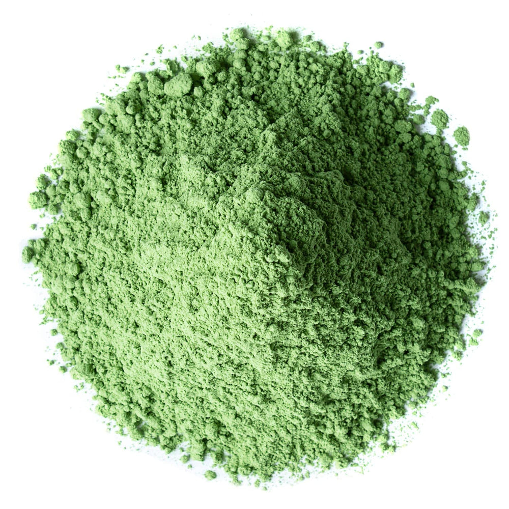 Food to Live wheatgrass powder dissolving in water for a healthy drink
