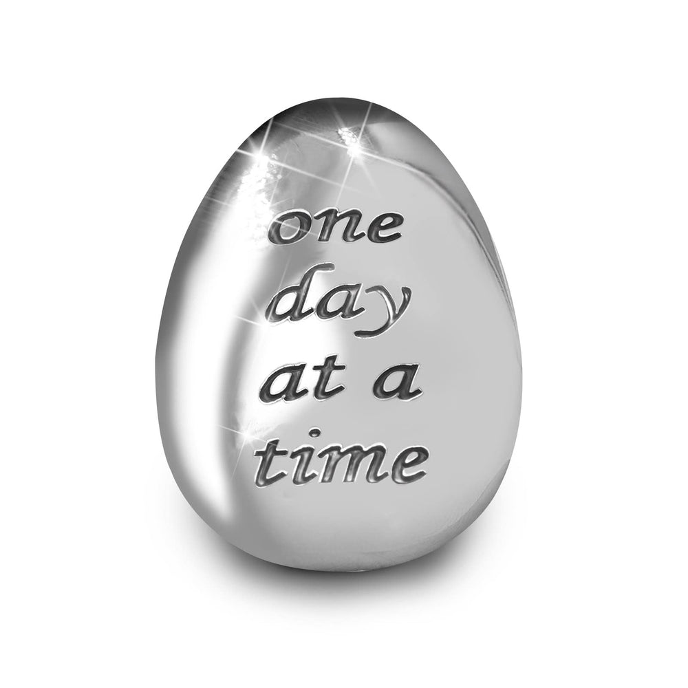 ForFine soothing stone thumb stone close-up with One day at a time engraving for portable calm