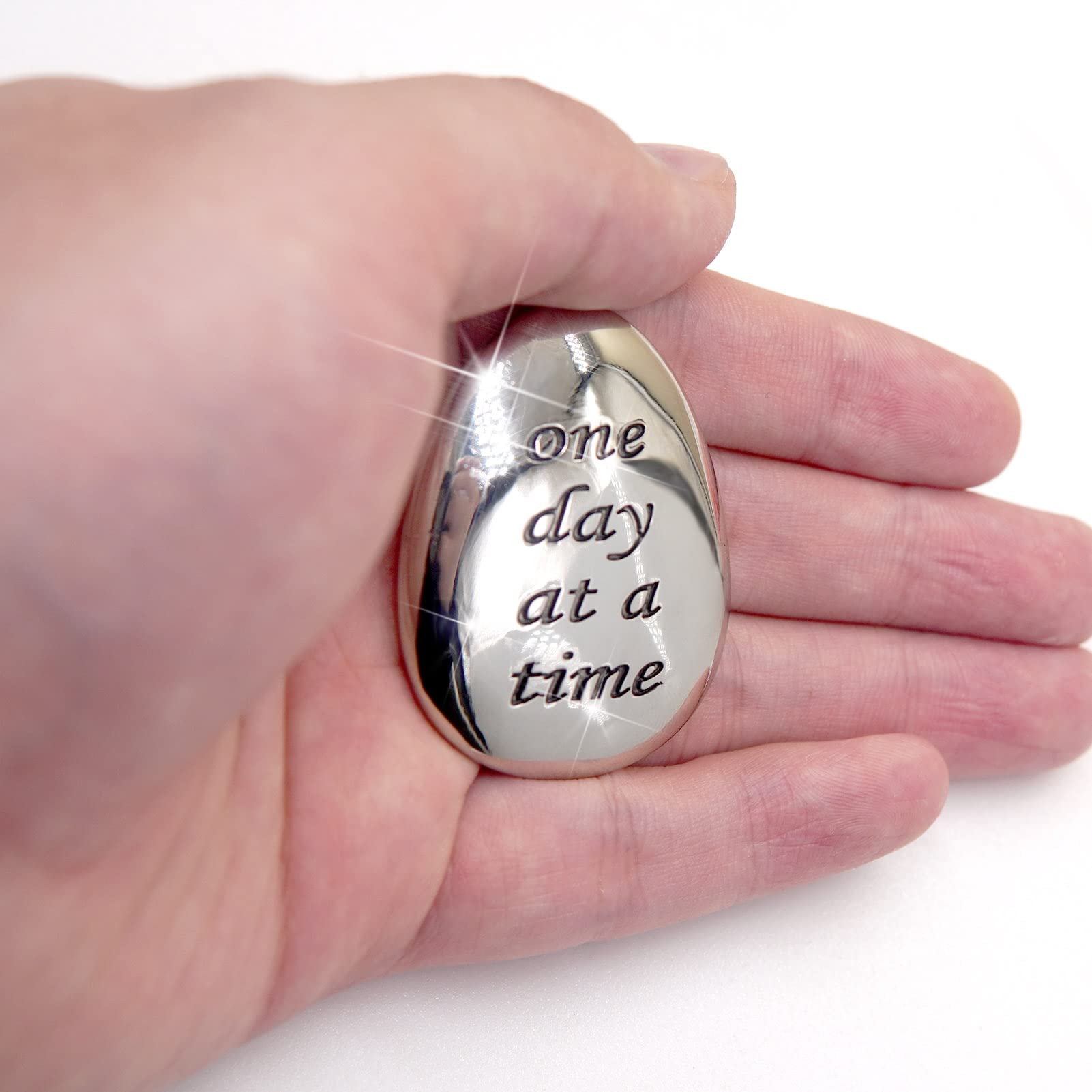 ForFine thumb stone on desk as a discreet mindfulness tool