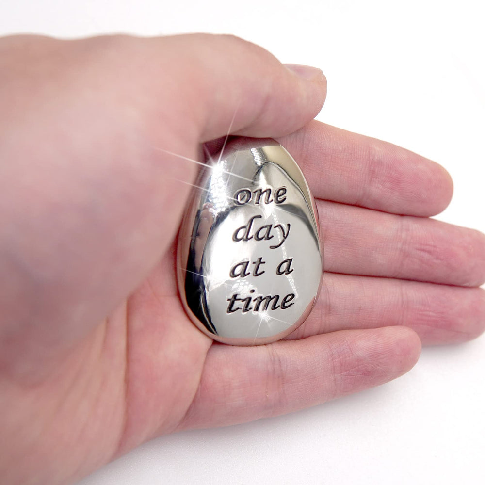 ForFine thumb stone on desk as a discreet mindfulness tool