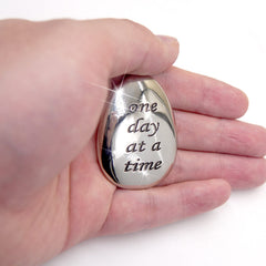 ForFine thumb stone on desk as a discreet mindfulness tool
