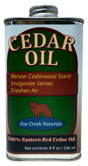 Fox Creek Cedar Oil bottle close-up with pure cedar aroma.