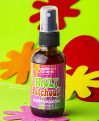 Frankie and Myrrh Truly Patchouli spray diffusing in a cozy living room