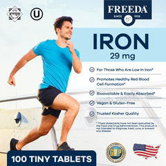 Freeda bottle close-up — tiny, easy-to-swallow iron tablets for daily use.
