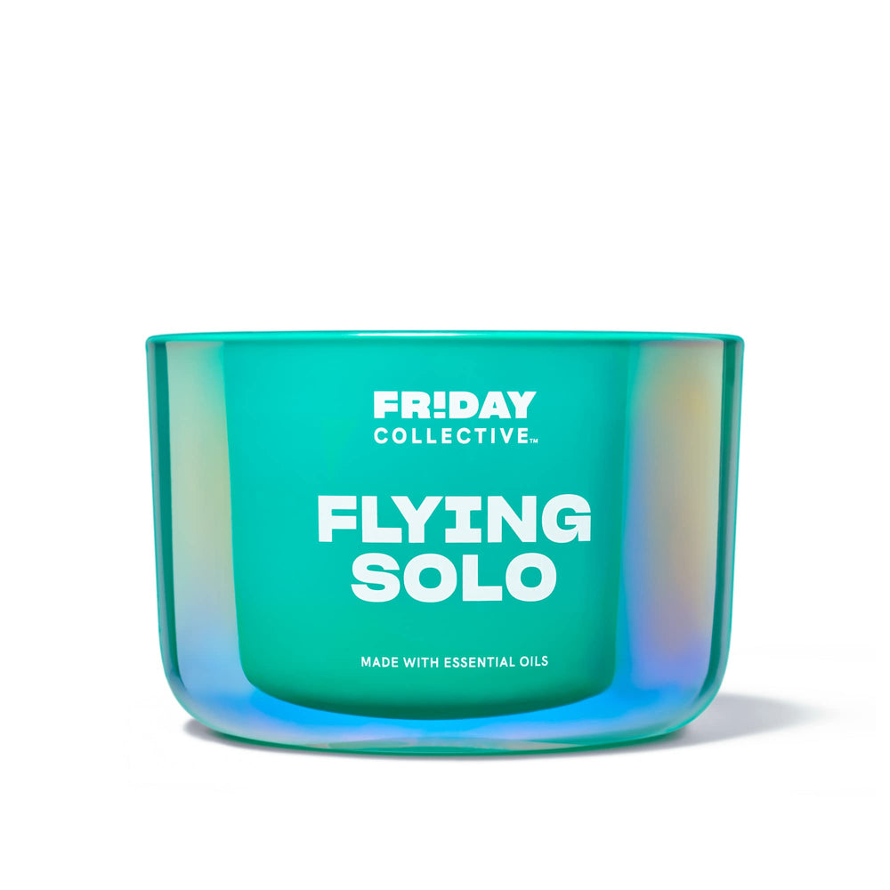 Friday Collective Flying Solo Candle jar reveals bright, uplifting fragrance for a calm room.