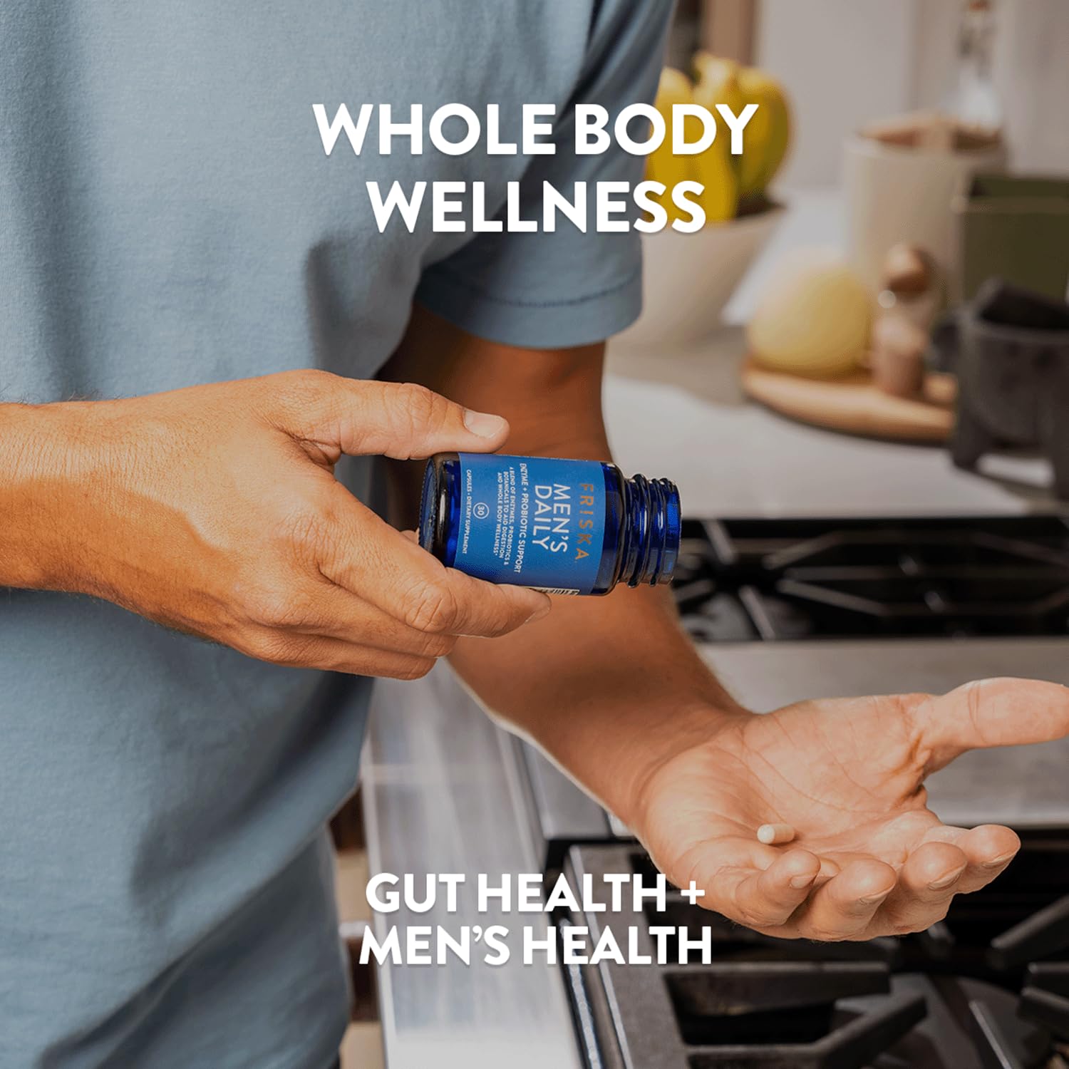 Friska Men’s Daily bottle on a kitchen counter beside meals
