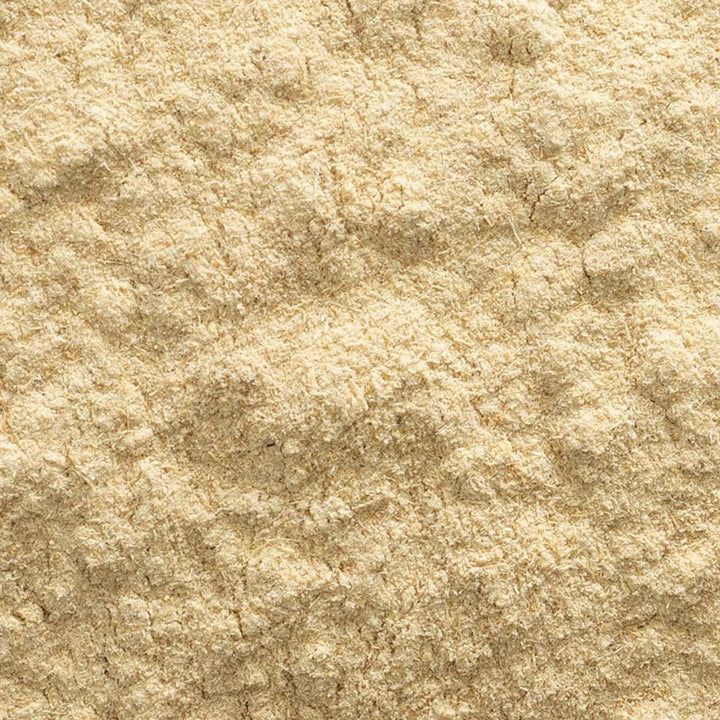 Frontier Co-op astragalus root powder with measuring scoop for smoothies.