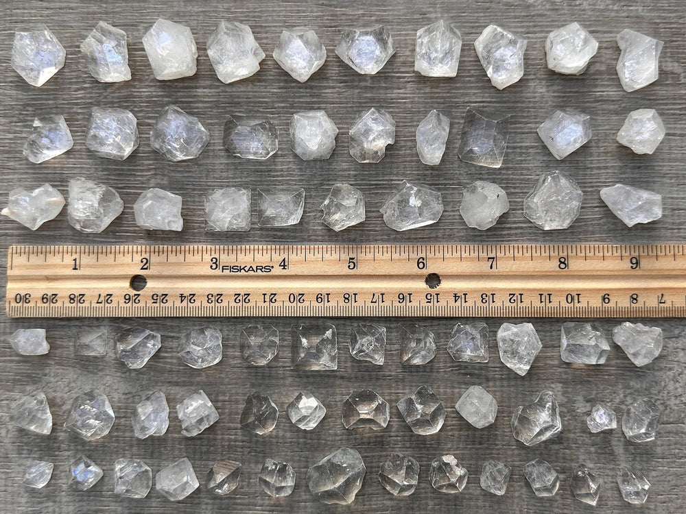 GAF TREASURES Clear apophyllite highlighting transparency and calm on a desk.