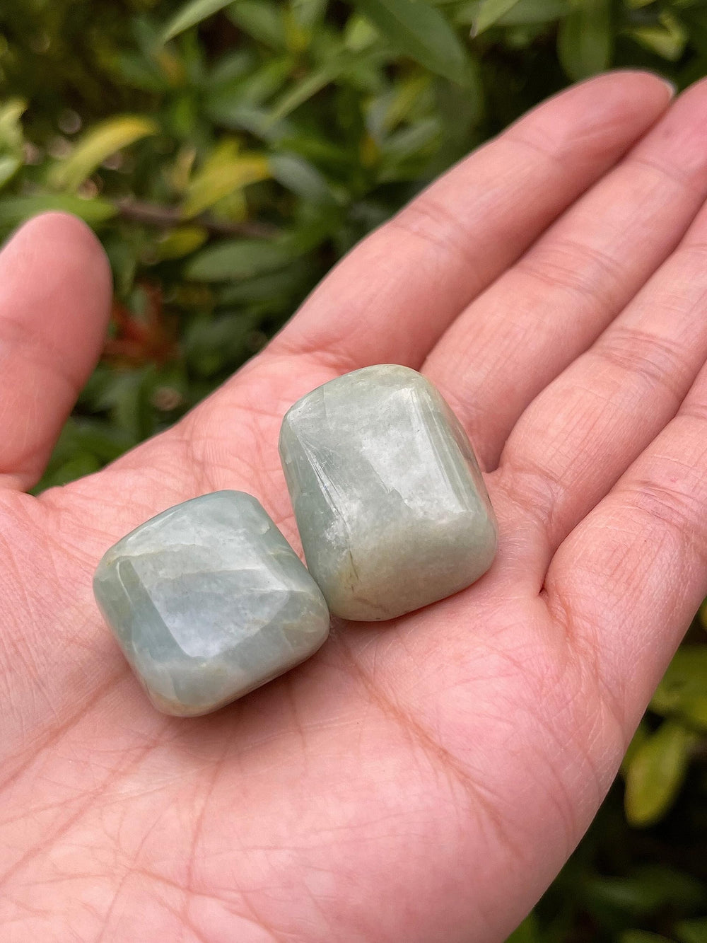 GAF Treasures Aquamarine tumbled stones arranged for crystal grid therapy sessions