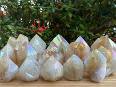 GAF Treasures Aura Citrine top polished rough point on shelf or altar for focal energy