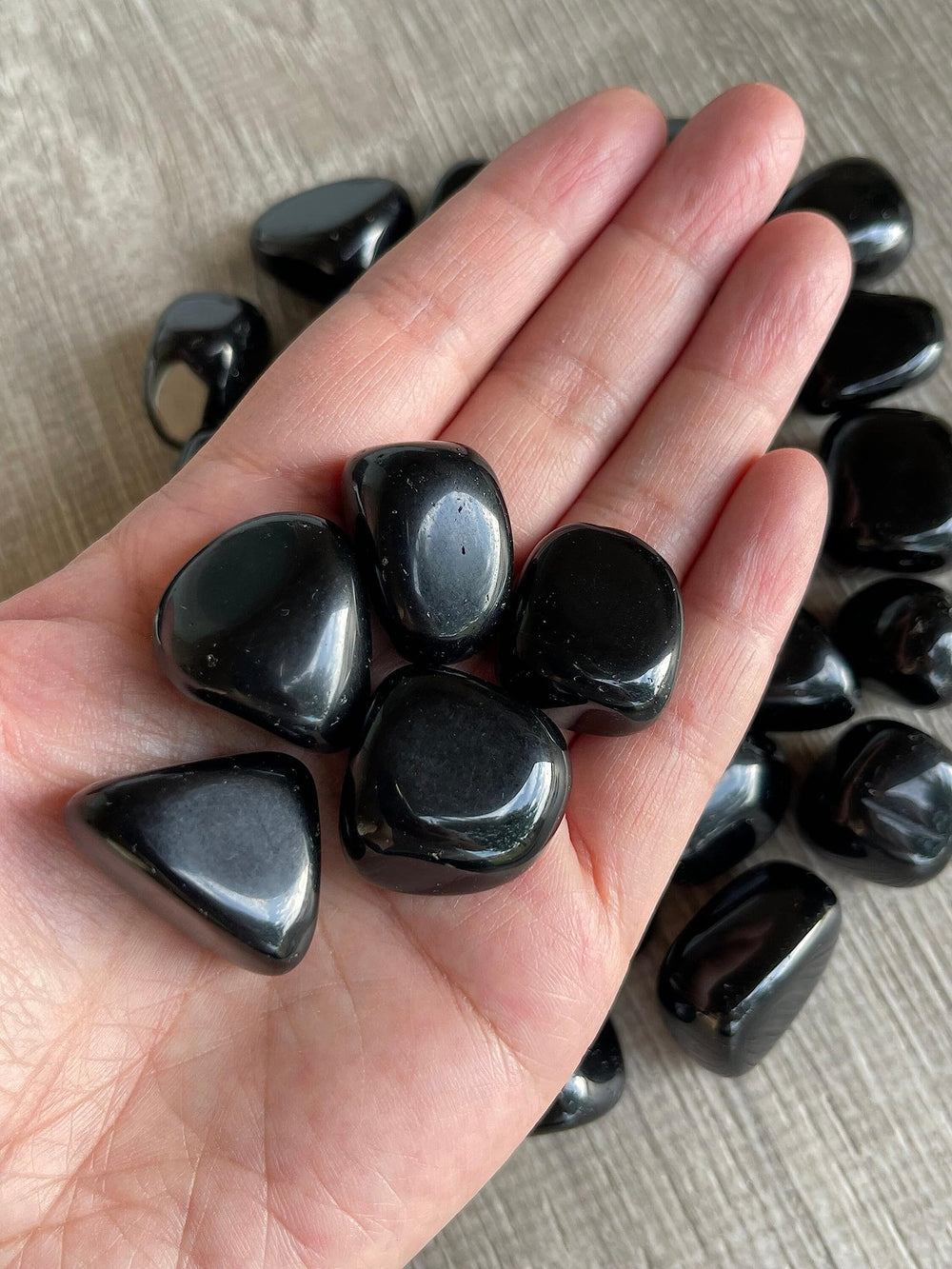 GAF TREASURES Black Obsidian stones show natural variation in shape and pattern.