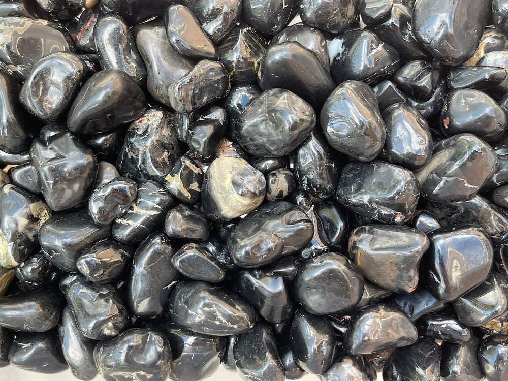Natural size variation in GAF TREASURES Onyx stones highlighting authentic beauty