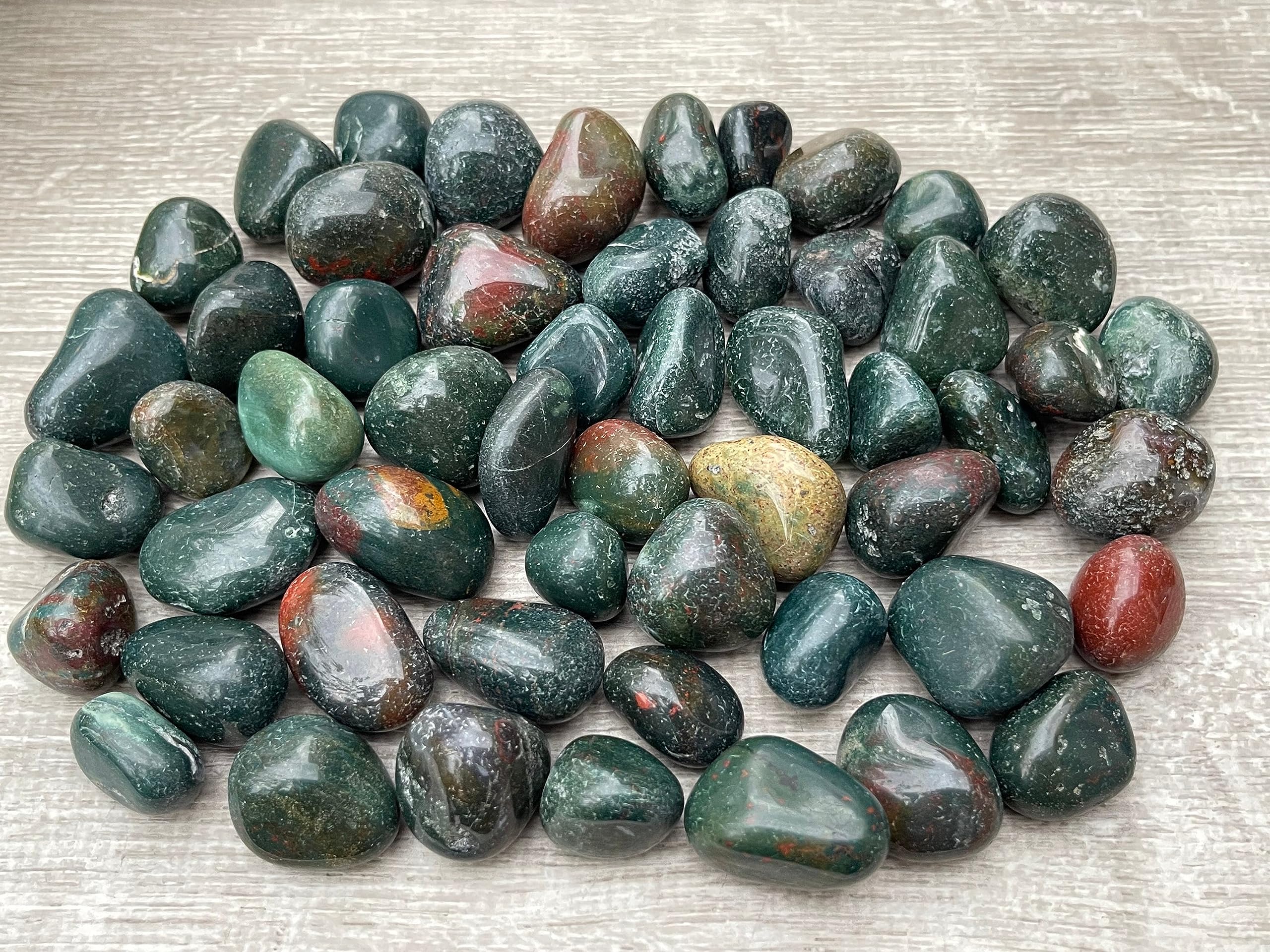 GAF TREASURES Bloodstone tumbled stones arranged for grid work and meditation