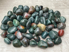GAF TREASURES Bloodstone tumbled stones arranged for grid work and meditation