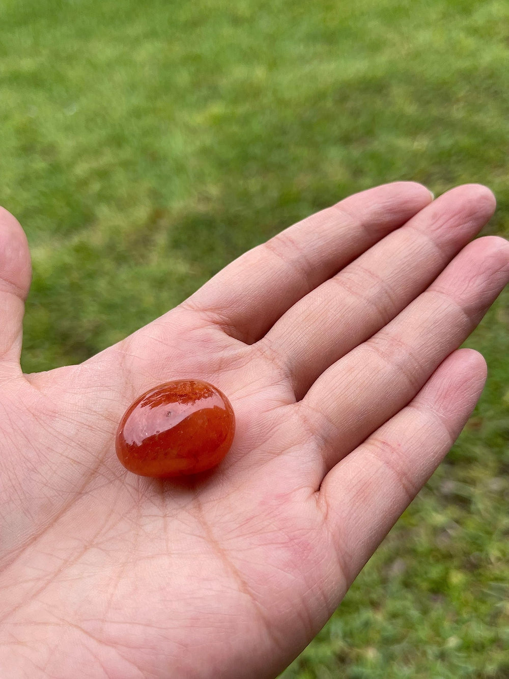 GAF TREASURES Carnelian tumbled stones catching sunlight for warm energizing aesthetic
