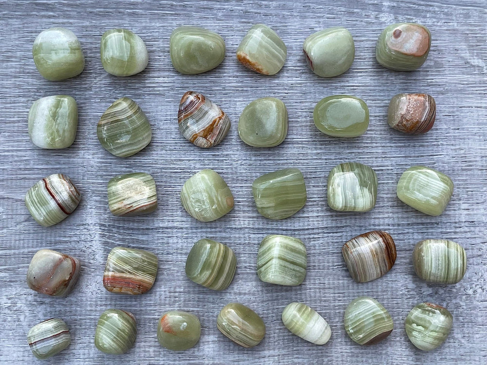 Green Onyx stones arranged for grid work and display