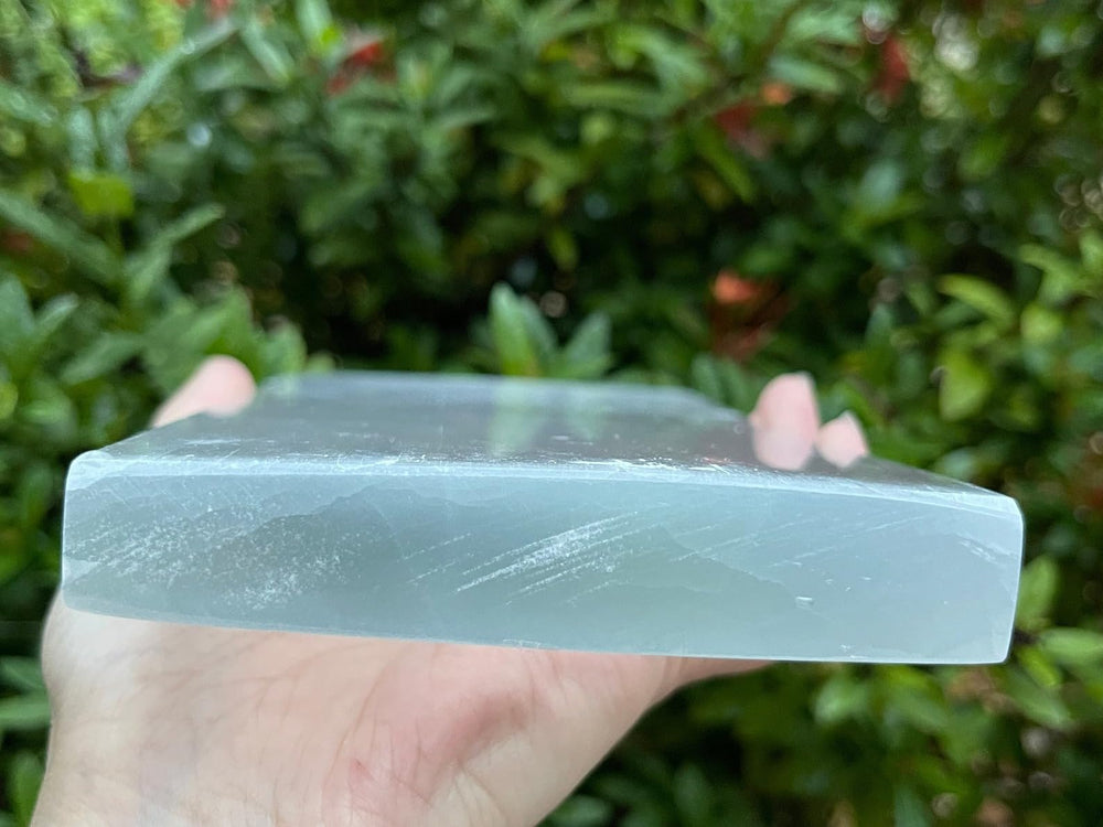 Hand-carved edge on the GAF TREASURES selenite slab shows natural variation