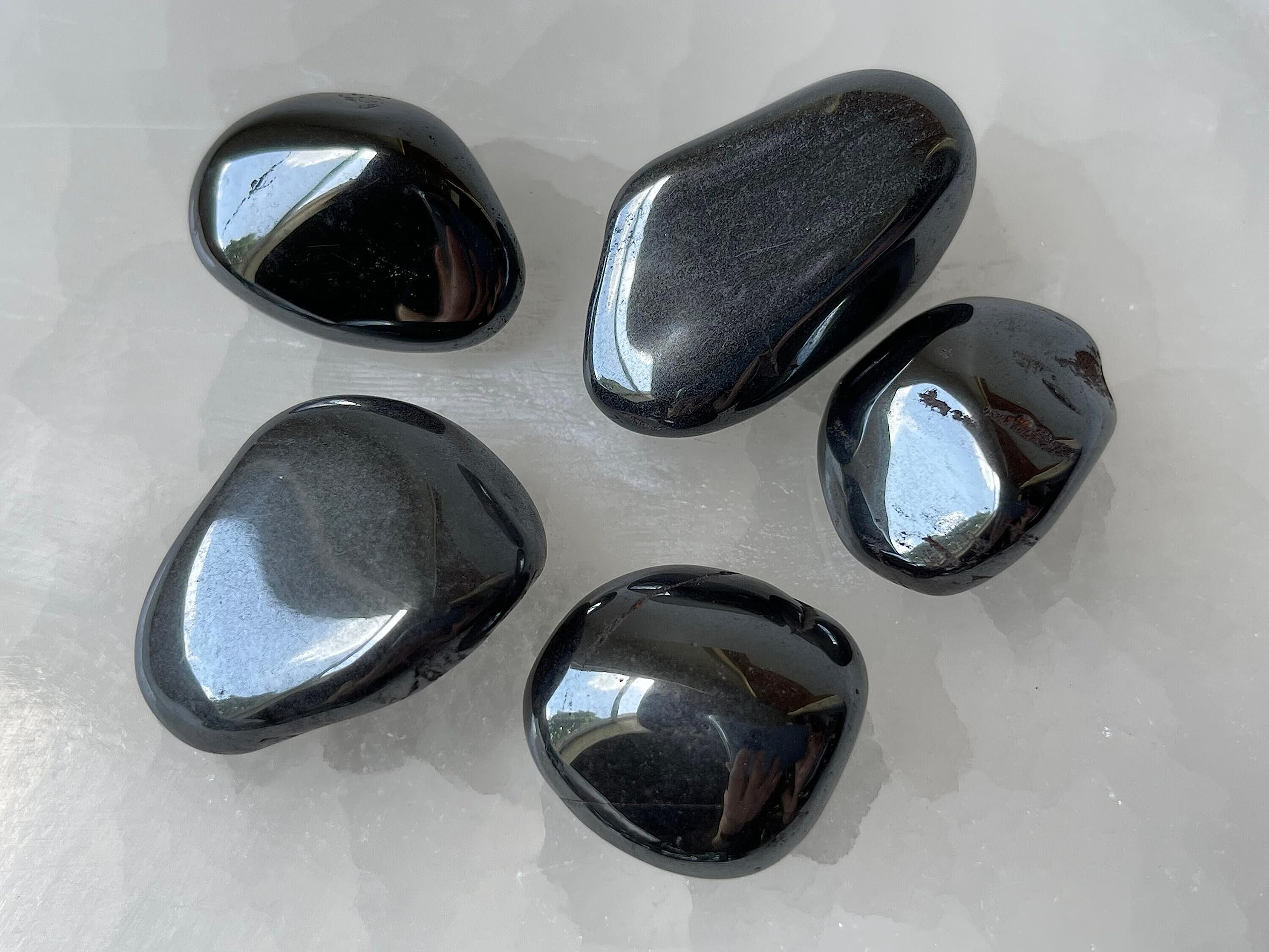GAF TREASURES hematite stones arranged for crystal grid work and balance