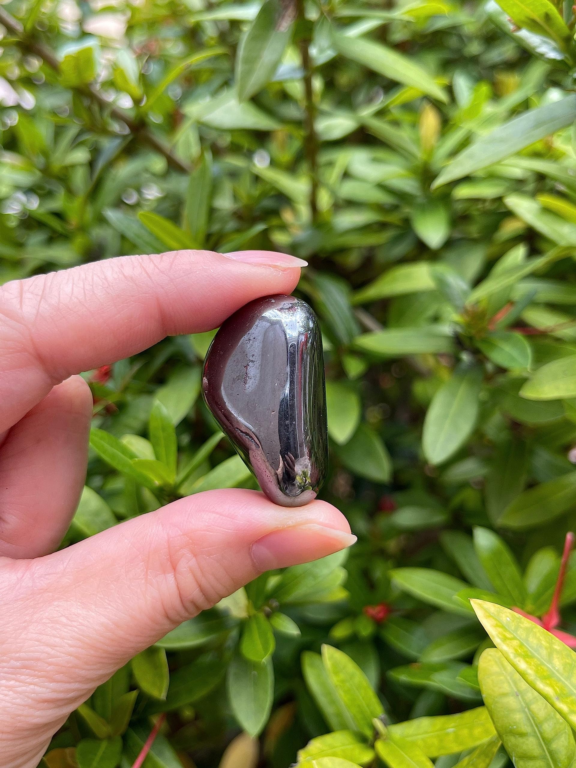 GAF TREASURES hematite stones in hand highlighting size range for craft projects
