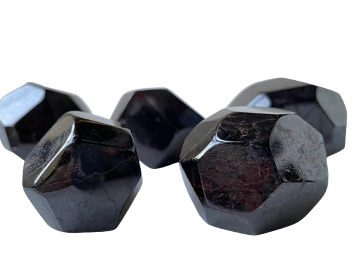 GAF TREASURES garnet polygon polished closeup showing deep red facets for meditation
