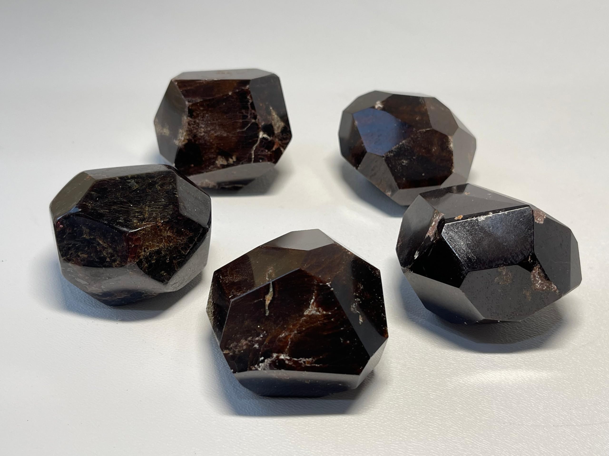 GAF TREASURES garnet polygon polished weight and tactile feel in palm