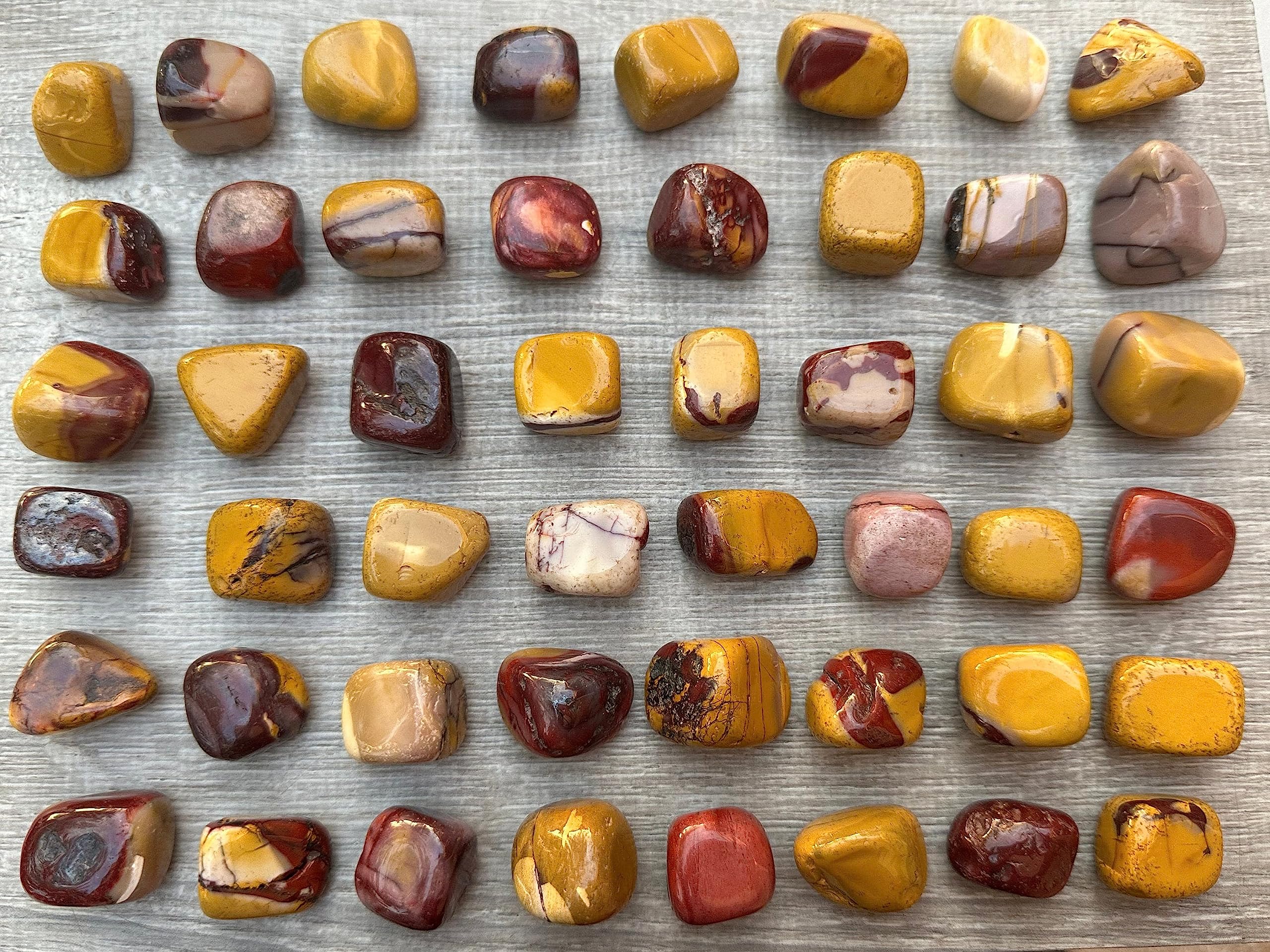 GAF TREASURES Mookaite pieces highlight earthy reds and creams for focus