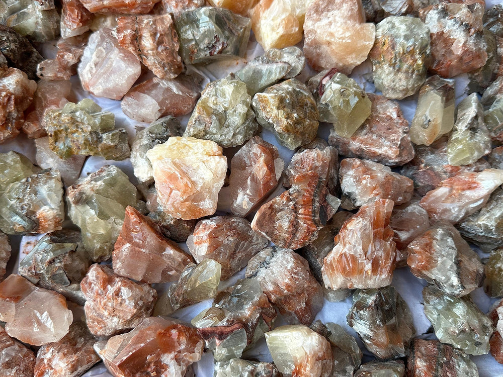 GAF TREASURES two-inch rough calcite stone ready for polishing experiments.