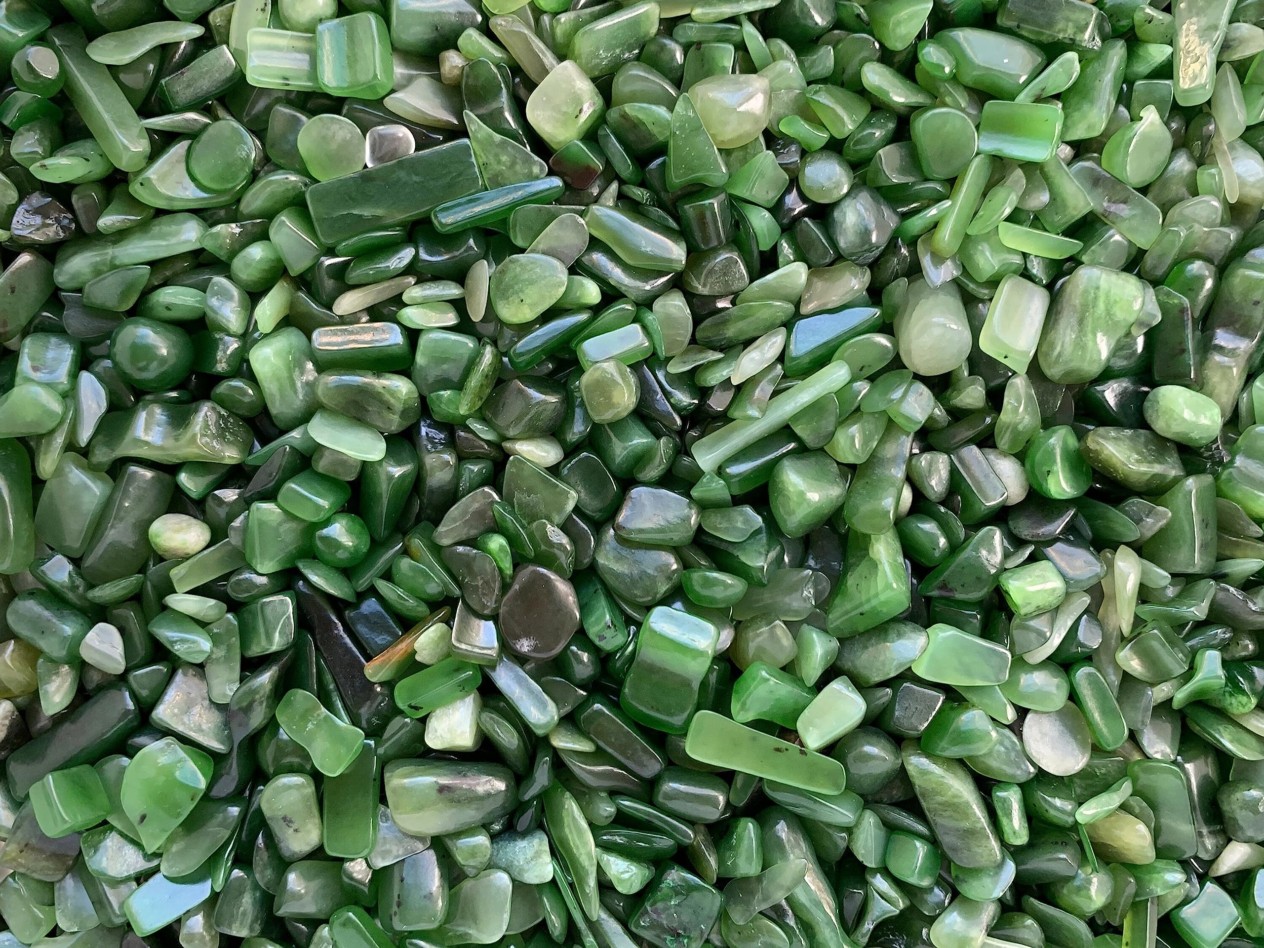 GAF TREASURES Nephrite Jade Chips show color variations for natural designs.