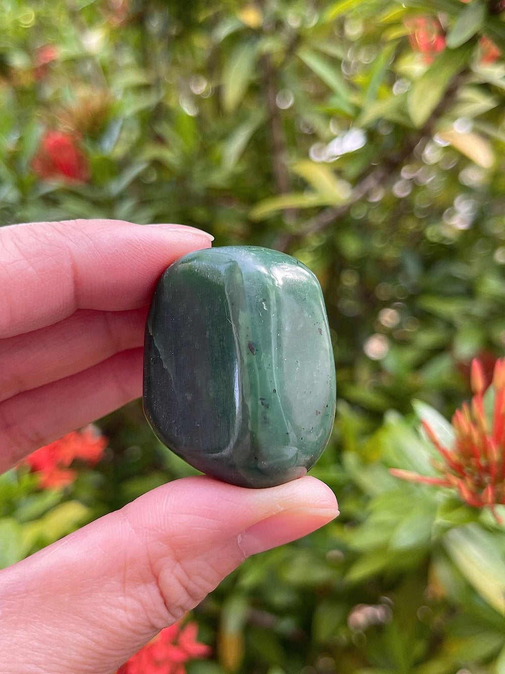 GAF TREASURES nephrite jade stones show varied green, white, and black hues for visual appeal.
