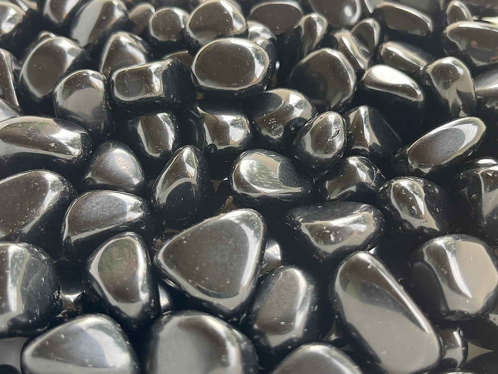 GAF TREASURES 0.75-1 inch obsidian stones with scale.