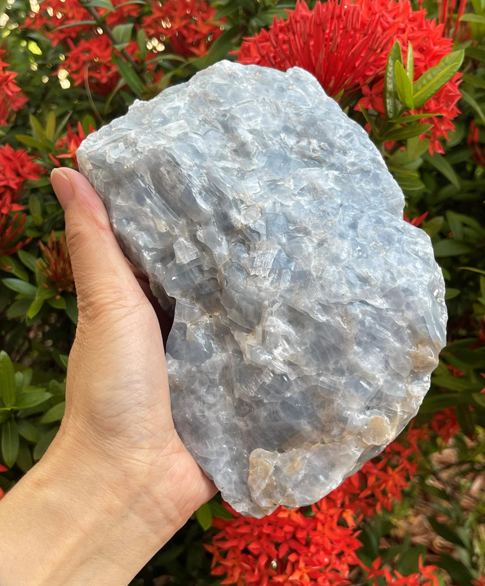 GAF TREASURES orange calcite rough stone for spiritual practices and energy work.