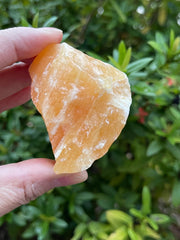 GAF TREASURES orange calcite rough close-up showing vibrant color for display and meditation.