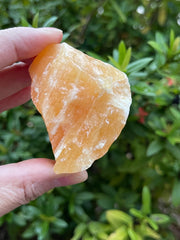 GAF TREASURES orange calcite rough texture details ideal for mineral study and collection.