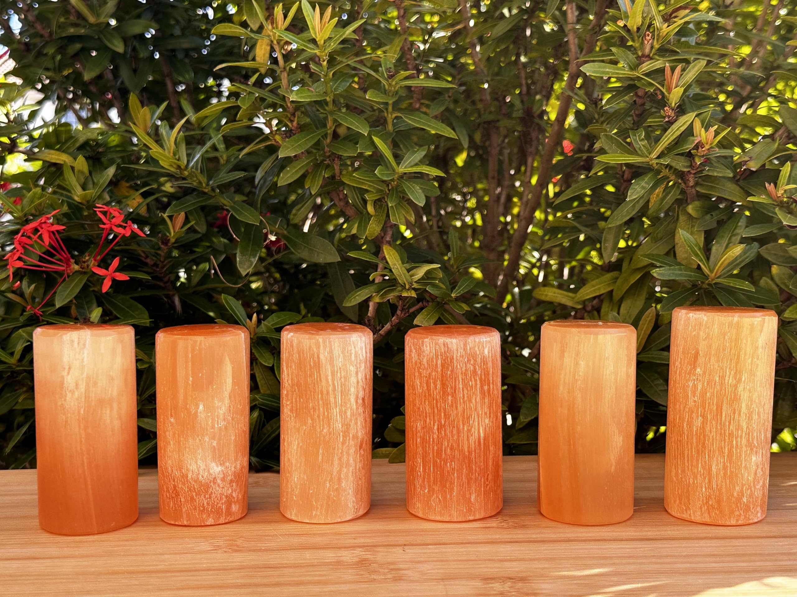 Hand-carved details and color variation emphasize artisan craftsmanship.