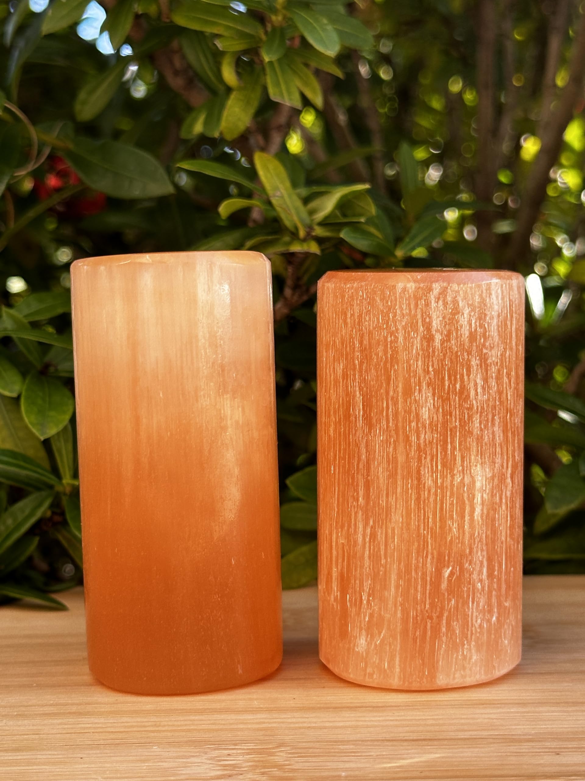 GAF Treasures orange selenite harmonizer cylinder pair, polished and ready for meditation and positive energy.