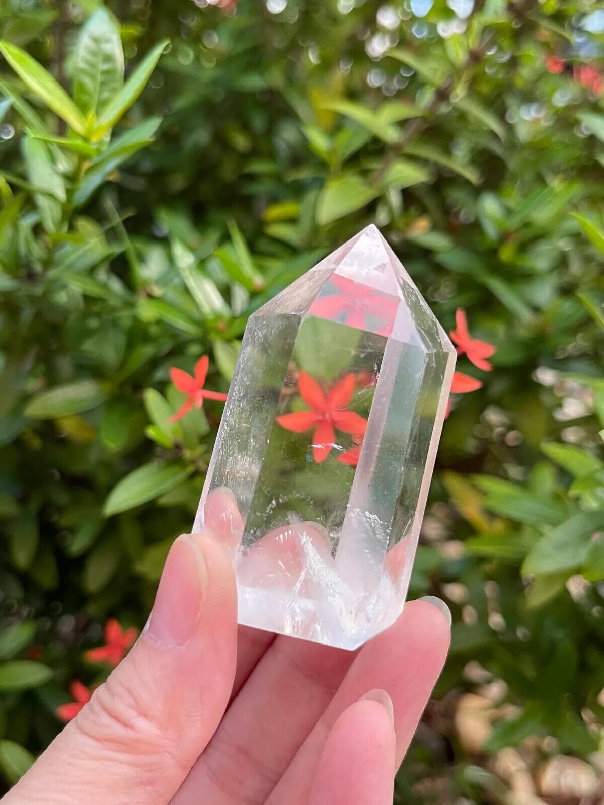 GAF TREASURES Premium Clear Quartz Obelisk on altar enhances intention setting.
