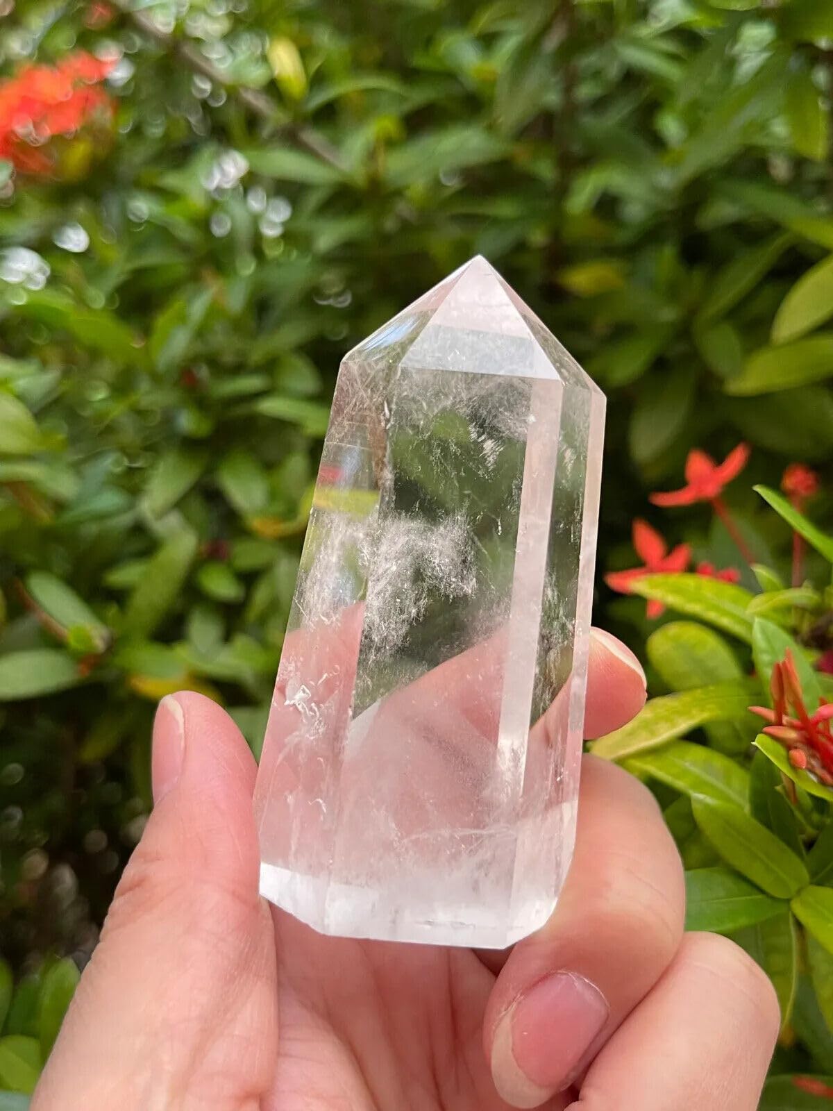 GAF TREASURES Premium Clear Quartz Obelisk on desk anchors space and focus.