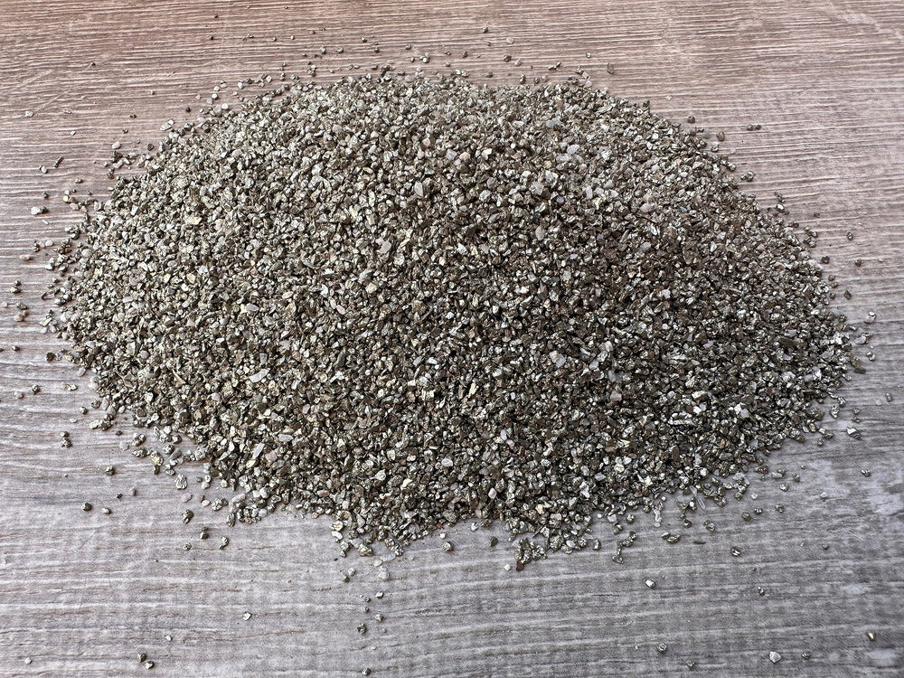 GAF TREASURES Pyrite sand chips in art display for creative layouts.