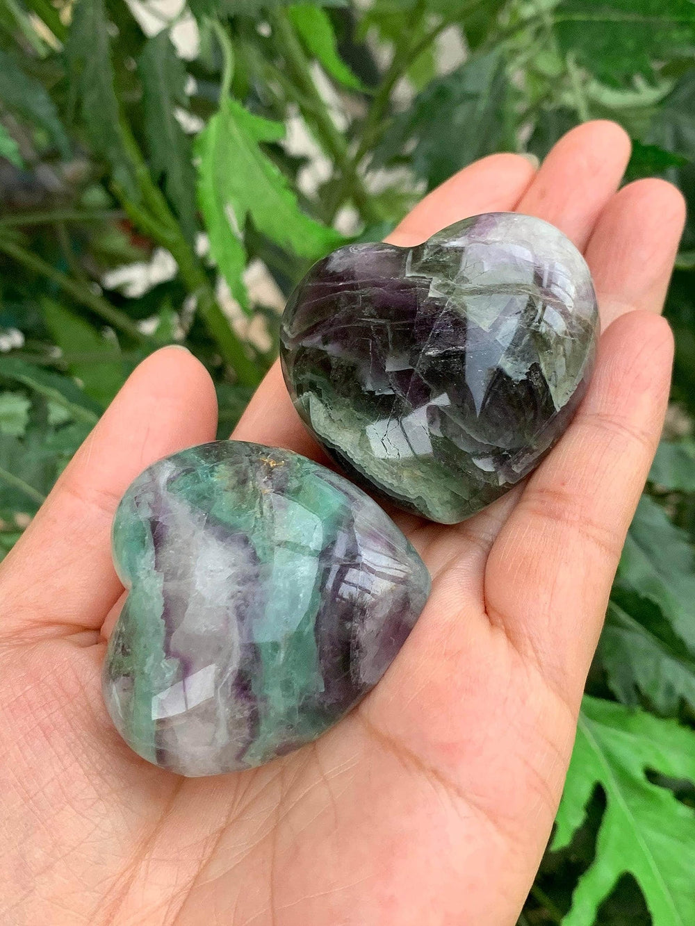 GAF TREASURES Rainbow Fluorite Heart handheld in palm encourages calm and grounding during rituals