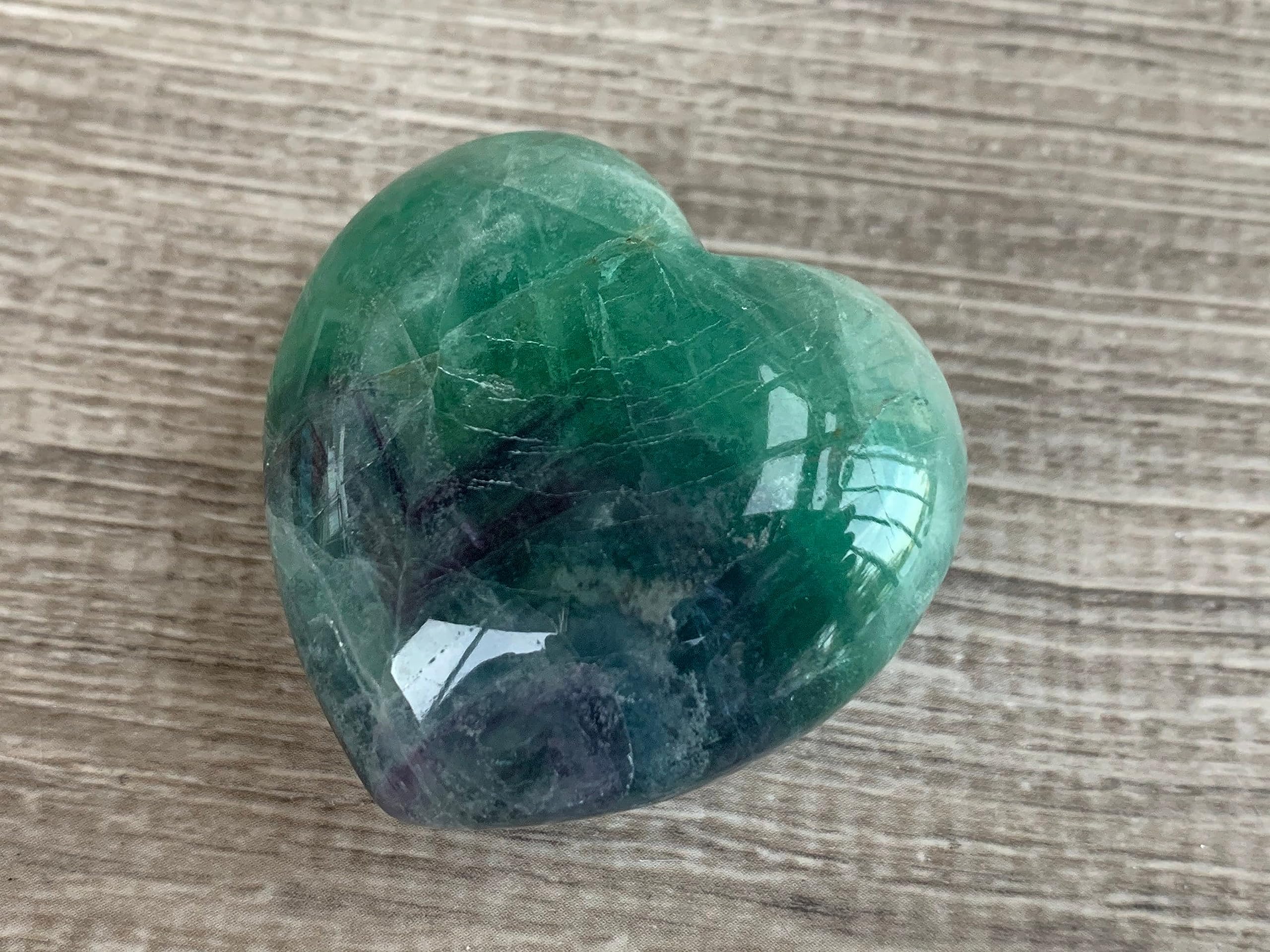 GAF TREASURES Rainbow Fluorite Heart polished surface highlights smooth texture and shine