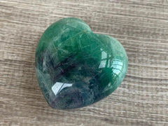 GAF TREASURES Rainbow Fluorite Heart polished surface highlights smooth texture and shine