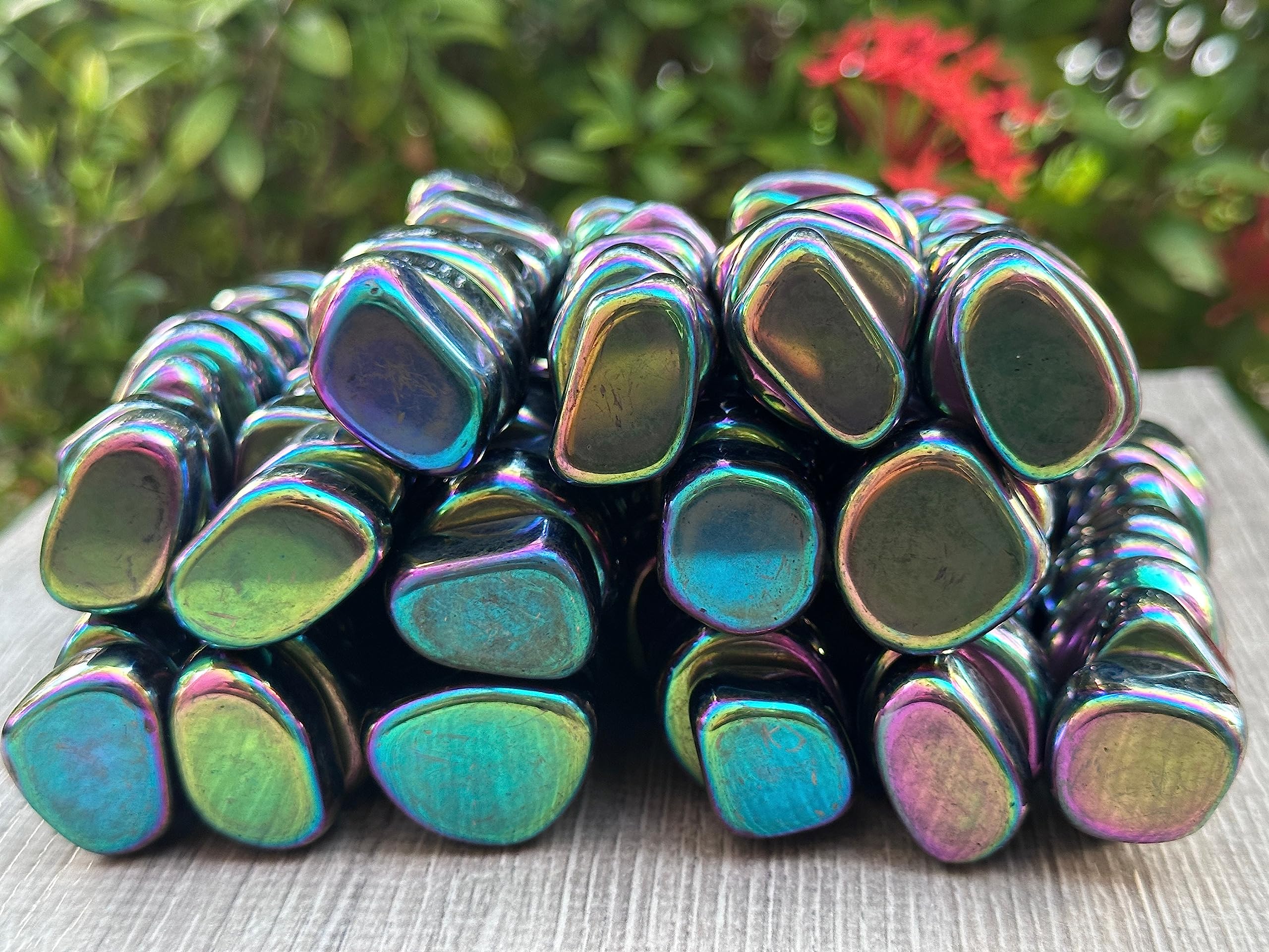 GAF Treasures Rainbow Magnetic Hematite stones display shifting hues for visual mindfulness.