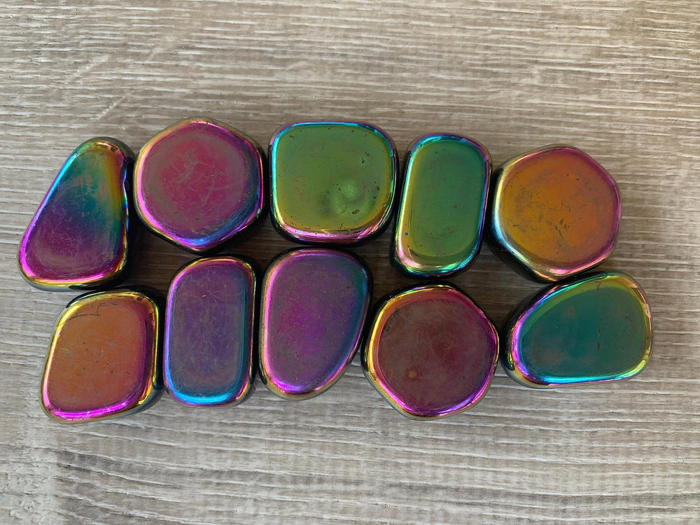 GAF Treasures Rainbow Hematite tumbled stones highlight purple and blue hues for crystal art.