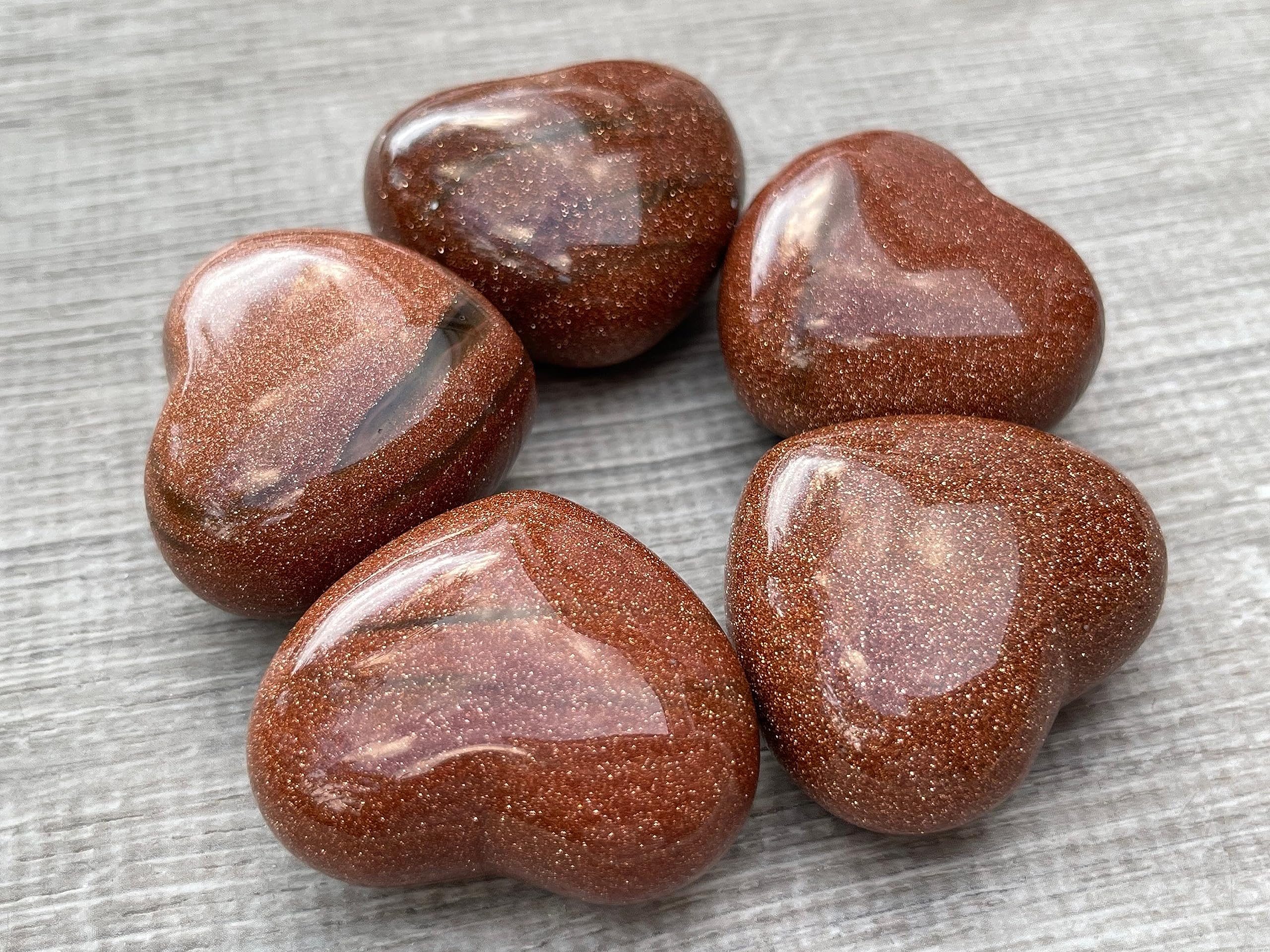 GAF Treasures Red Goldstone natural variations with unique beauty