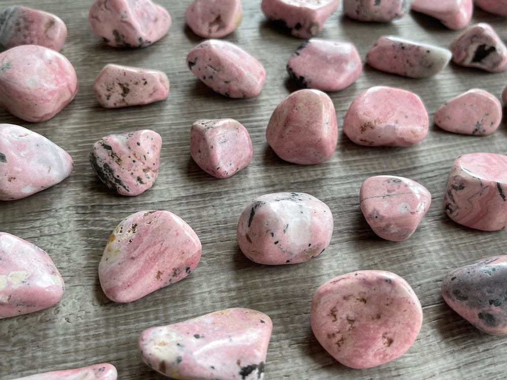 GAF TREASURES Rhodonite stones beside pockets for everyday emotional support