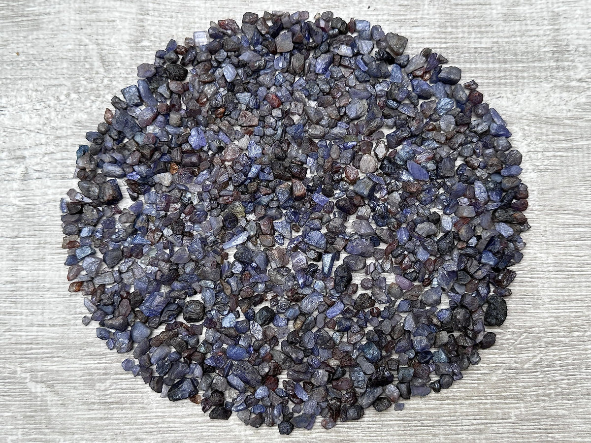 GAF Treasures Sapphire Chips pile; natural mini stones ideal for jewelry and crafts.