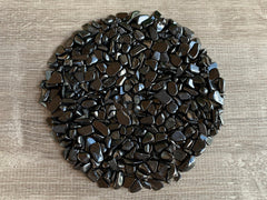 GAF TREASURES Shungite Chips show natural mini stones for crafts and decor projects.